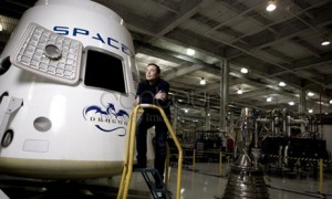 Elon Musk with Dragon capsule